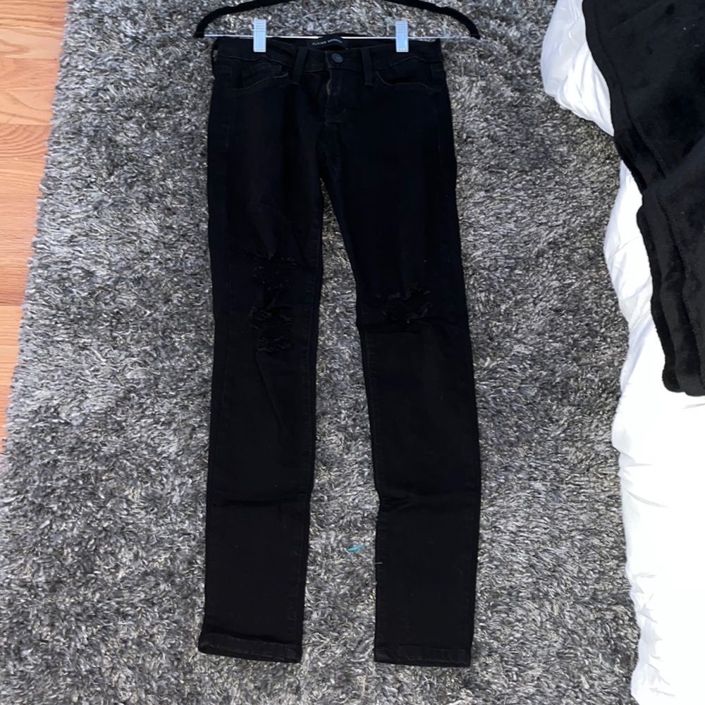 Flying Monkey, Black skinny with stretch distressed . Rips on the knees